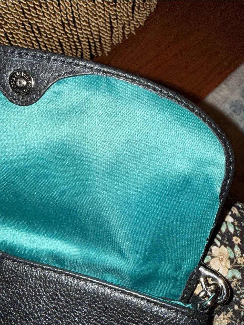 Black leather coach wristlet